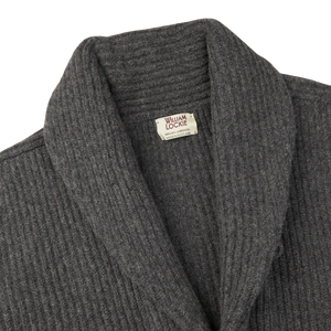 A William Lockie Cliff Grey Lambswool Shawl Collar Cardigan with leather buttons.