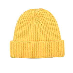 William Lockie's Daffodil Yellow Geelong Lambswool Ribbed Beanie, featuring a folded brim, is showcased against a white background.