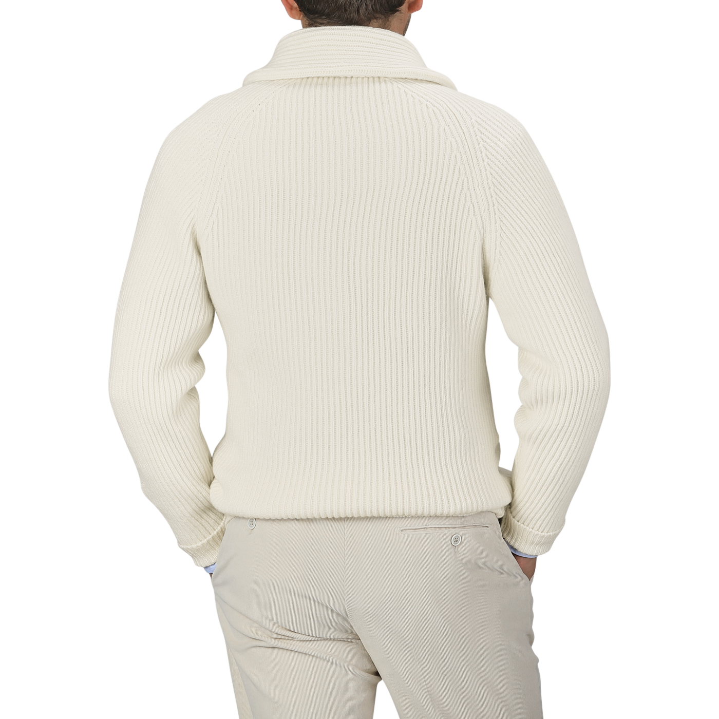 A person is seen from behind wearing the William Lockie Ecru Beige Lambswool Shawl Collar Cardigan and beige pants, standing against a plain gray background.