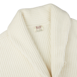 An Ecru Beige Lambswool Shawl Collar Cardigan made of Scottish lambswool with a William Lockie label on it.