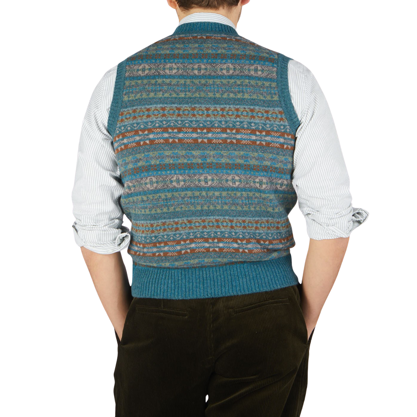 The back view of a man wearing a William Lockie Hunter Blue Fair Isle V-Neck Lambswool Slipover made of Scottish lambswool.
