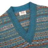 The William Lockie Hunter Blue Fair Isle V-Neck Lambswool Slipover, made of Scottish lambswool, features a blue and brown Fairisle pattern.