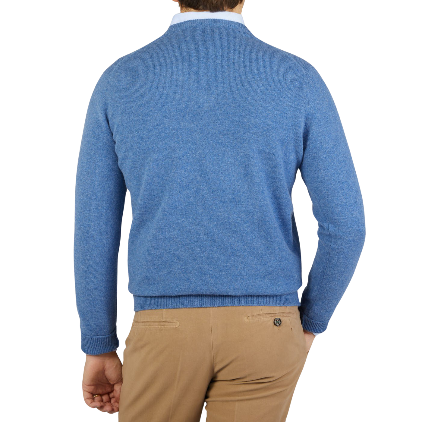 The back view of a man wearing a William Lockie Jeans Blue Lambswool V-Neck Sweater and tan pants.