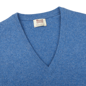 The men's William Lockie Jeans Blue Lambswool V-Neck Sweater.