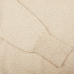 A close up of a William Lockie Linen Beige Knitted Cashmere Sportshirt.
