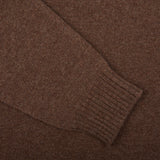 A close up of a William Lockie Mocha Brown Crew Neck Lambswool Sweater.
