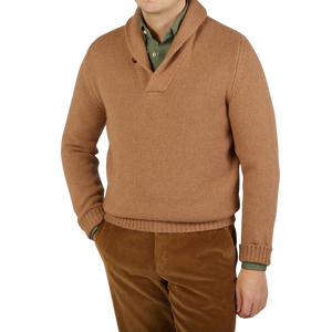 A man wearing a William Lockie Natural Camel Hair Short Shawl Collar Pullover made of pure camel hair.