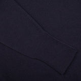 A close up of a William Lockie Navy Crew Neck Cashmere Sweater.