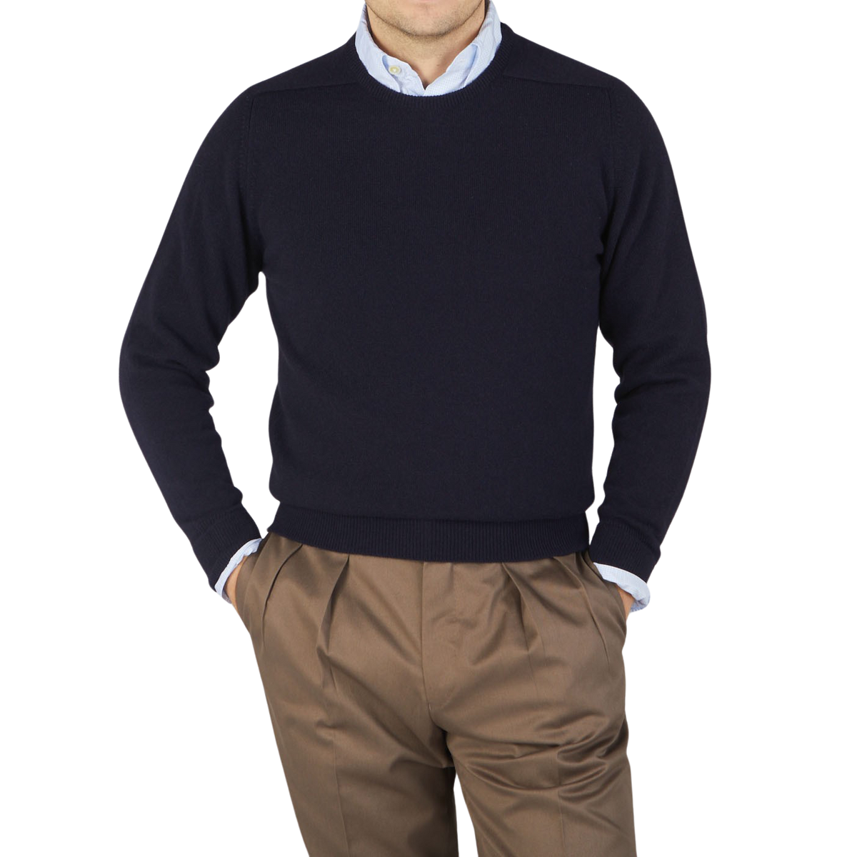 A man wearing a William Lockie Scottish Navy Crew Neck Cashmere Sweater and brown pants.