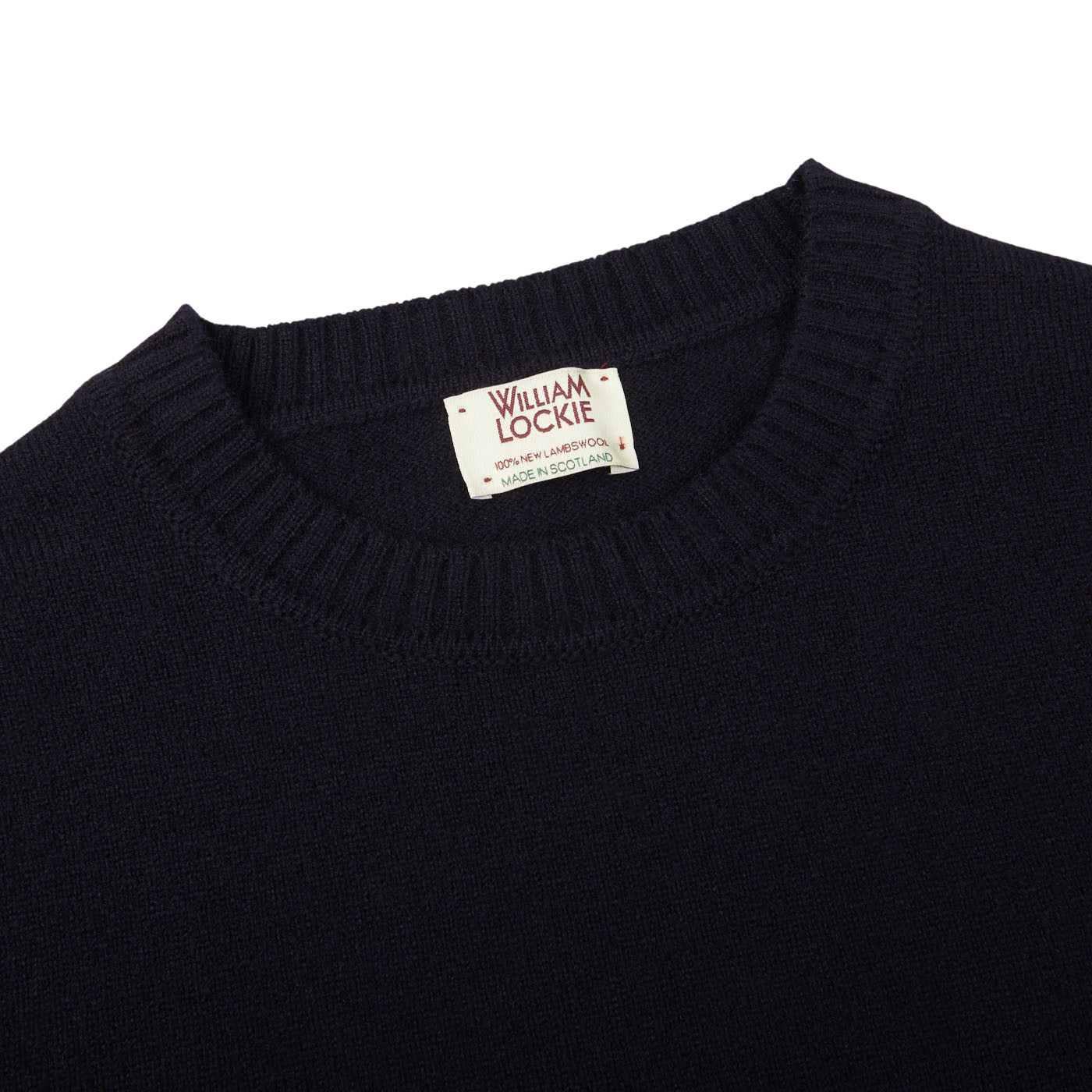 A Navy Crewneck Lambswool Sweater with a William Lockie label on it, perfect for layering.