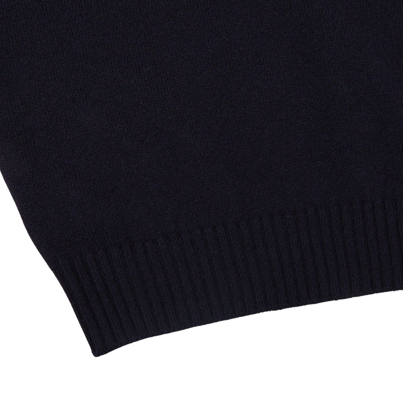 A close up of a Navy Crewneck Lambswool Sweater from William Lockie, perfect for layering.