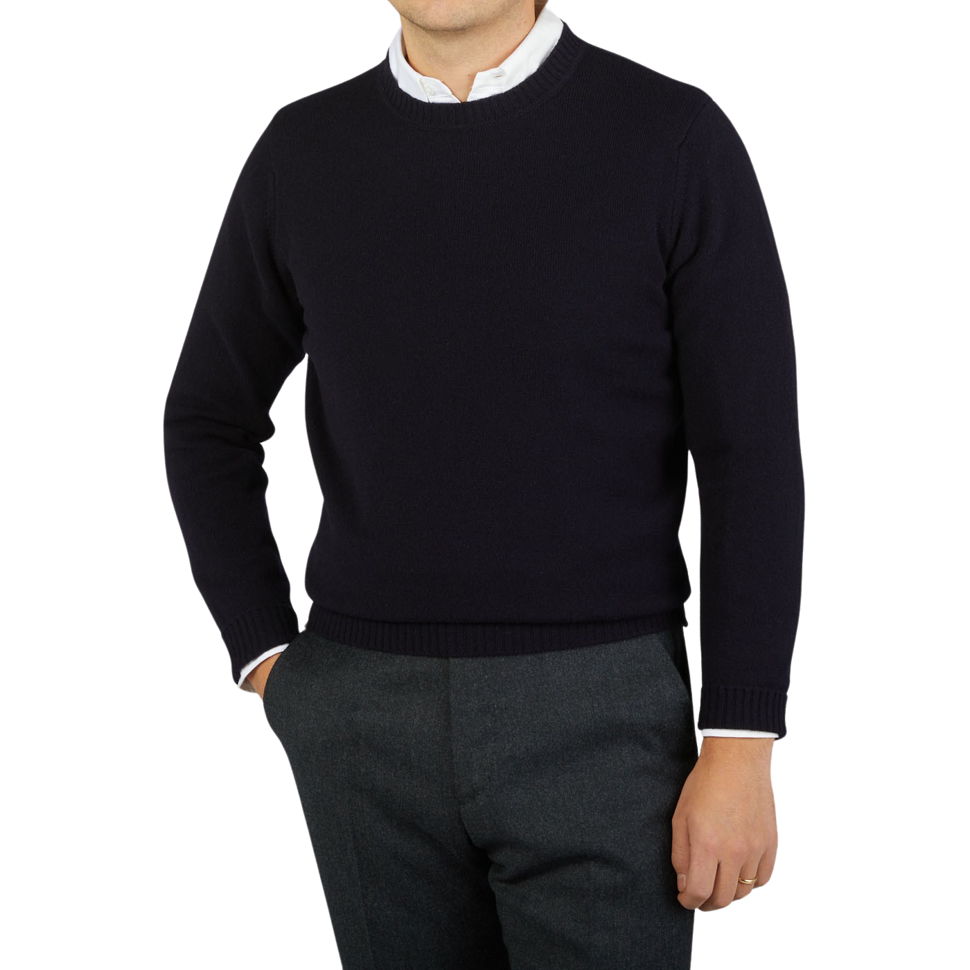 A man donning a William Lockie Navy Crewneck Lambswool Sweater.
