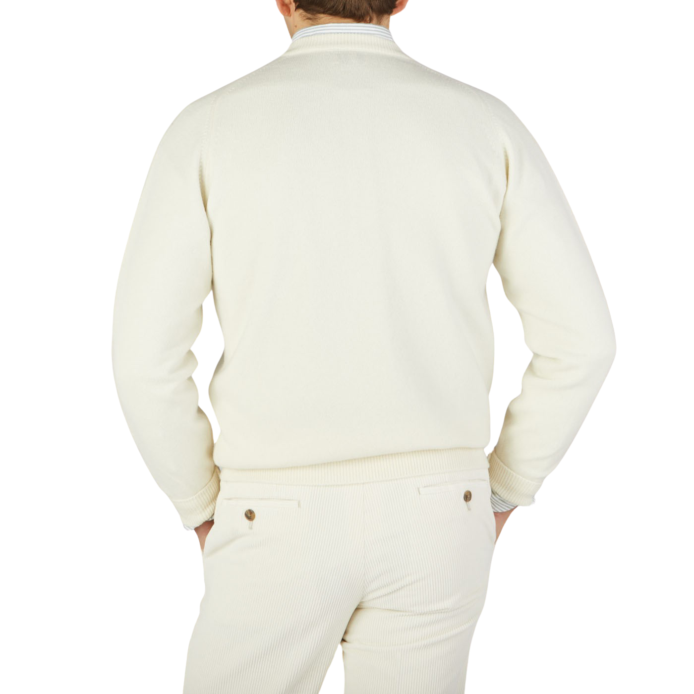 The back view of a man wearing a William Lockie Off-White Deep V-Neck Lambswool Sweater.