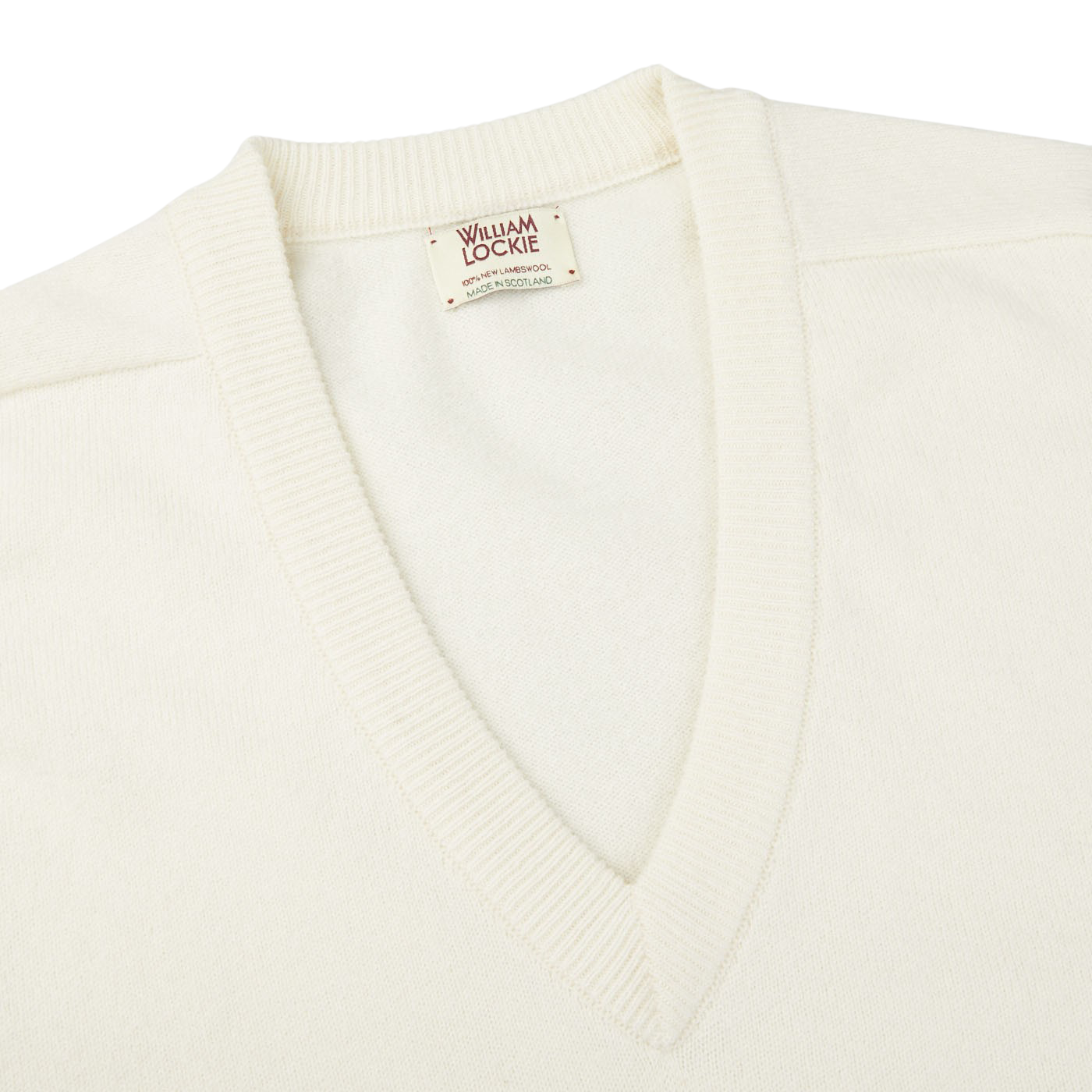 An Off-White Deep V-Neck Lambswool Sweater by William Lockie on a white background.