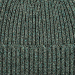 Close-up of the Peacock Geelong Lambswool Ribbed Beanie by William Lockie, highlighting its luxurious ribbed texture.