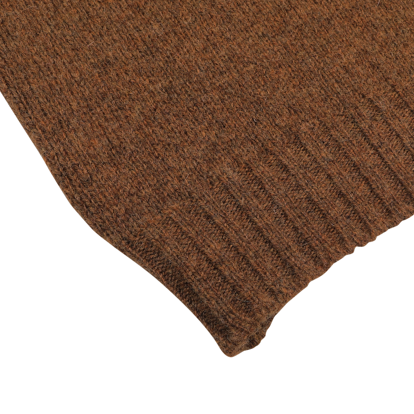 Close-up of the lower edge of a Pecan Brown Shetland Lambswool V-Neck Sweater by William Lockie, showcasing its ribbed hem.