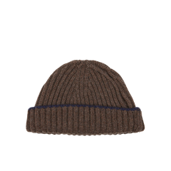 A Porcupine Blackberry Cashmere Ribbed Short Beanie with a blue stripe by William Lockie.