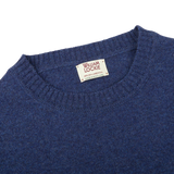 A William Lockie Rhapsody Blue Crew Neck Lambswool Sweater with a label on it.