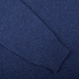 A close up of a William Lockie Rhapsody Blue Crew Neck Lambswool Sweater.