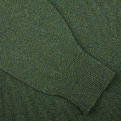 A close up of a Rosemary Green Lambswool Saddle Shoulder Cardigan, made with Scottish lambswool by William Lockie.