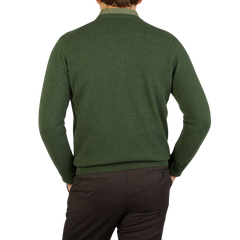 The back view of a man wearing a Rosemary Green V-Neck Lambswool Sweater by William Lockie, radiating warmth.