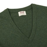 Stay cozy and comfortable this season with our William Lockie men's Rosemary Green V-Neck Lambswool Sweater.