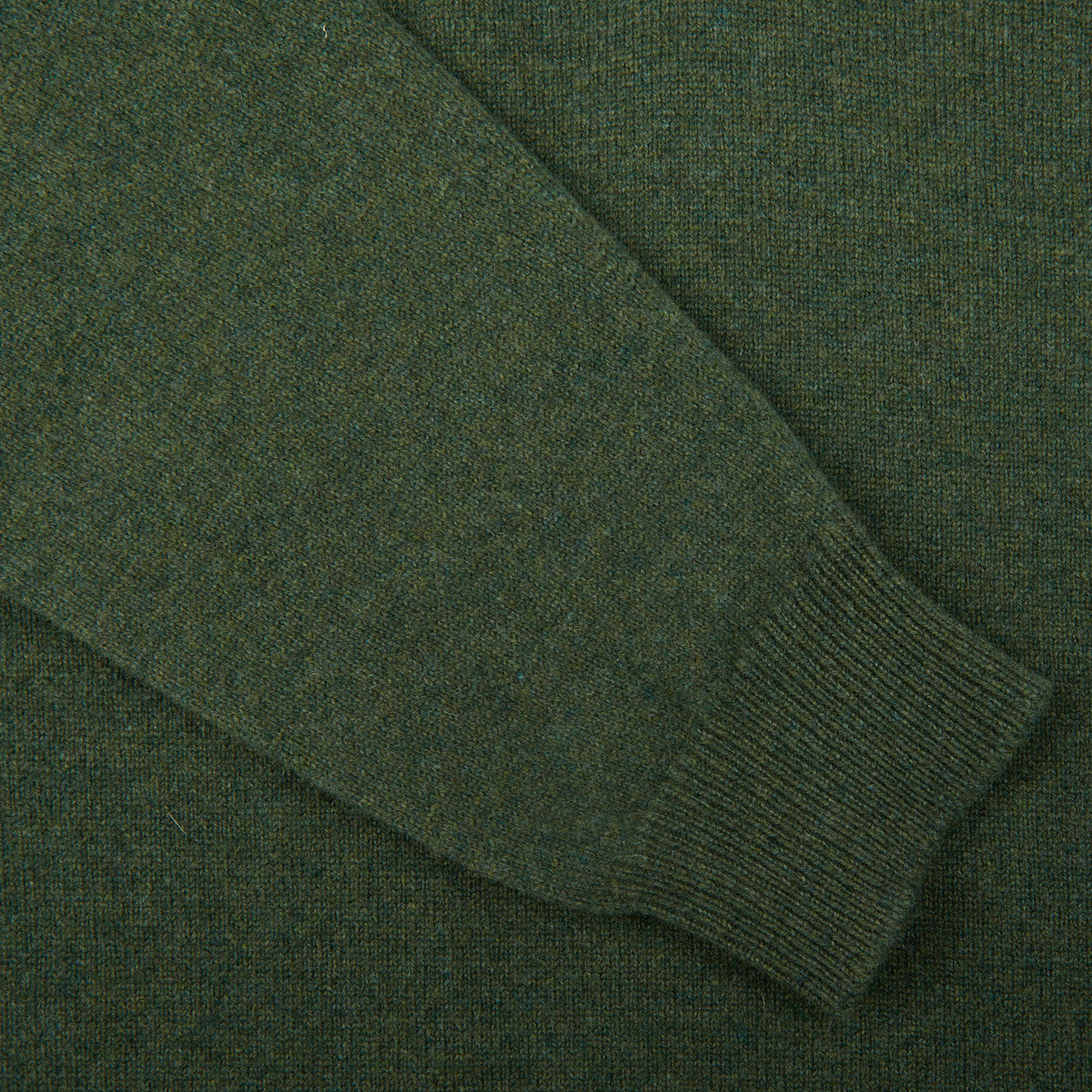 A close up of a Rosemary Green V-Neck Lambswool Sweater made by William Lockie.