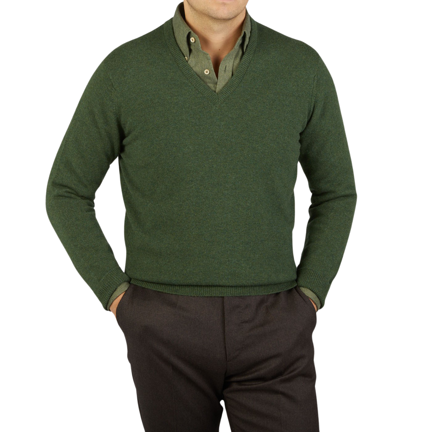 A man wearing a Rosemary Green V-Neck Lambswool Sweater by William Lockie for warmth.