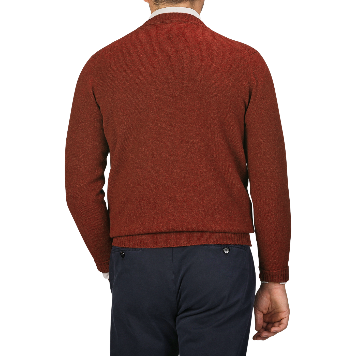 A man in a Sienna Brown William Lockie Crew Neck lambswool sweater and dark blue pants is shown from behind against a gray background.