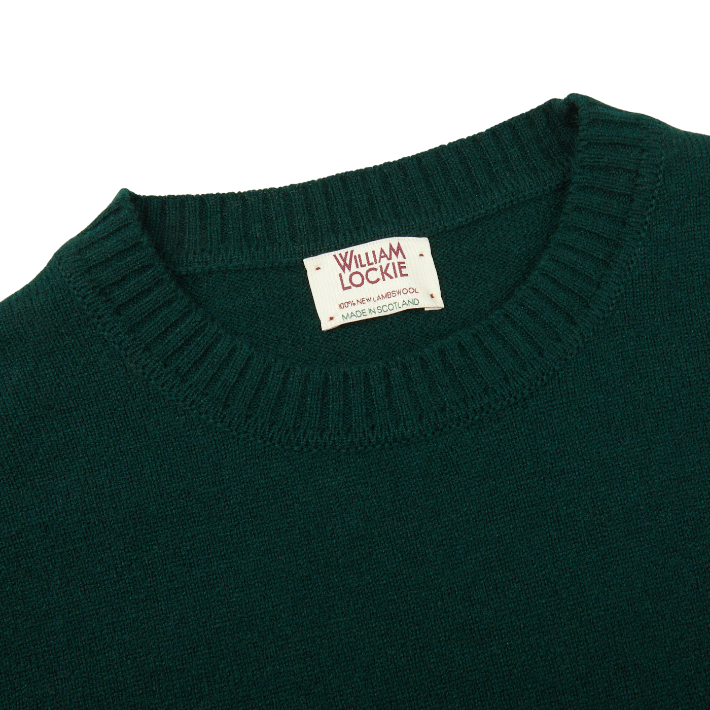A William Lockie Tartan Green Crew Neck Lambswool Sweater with a label on it.
