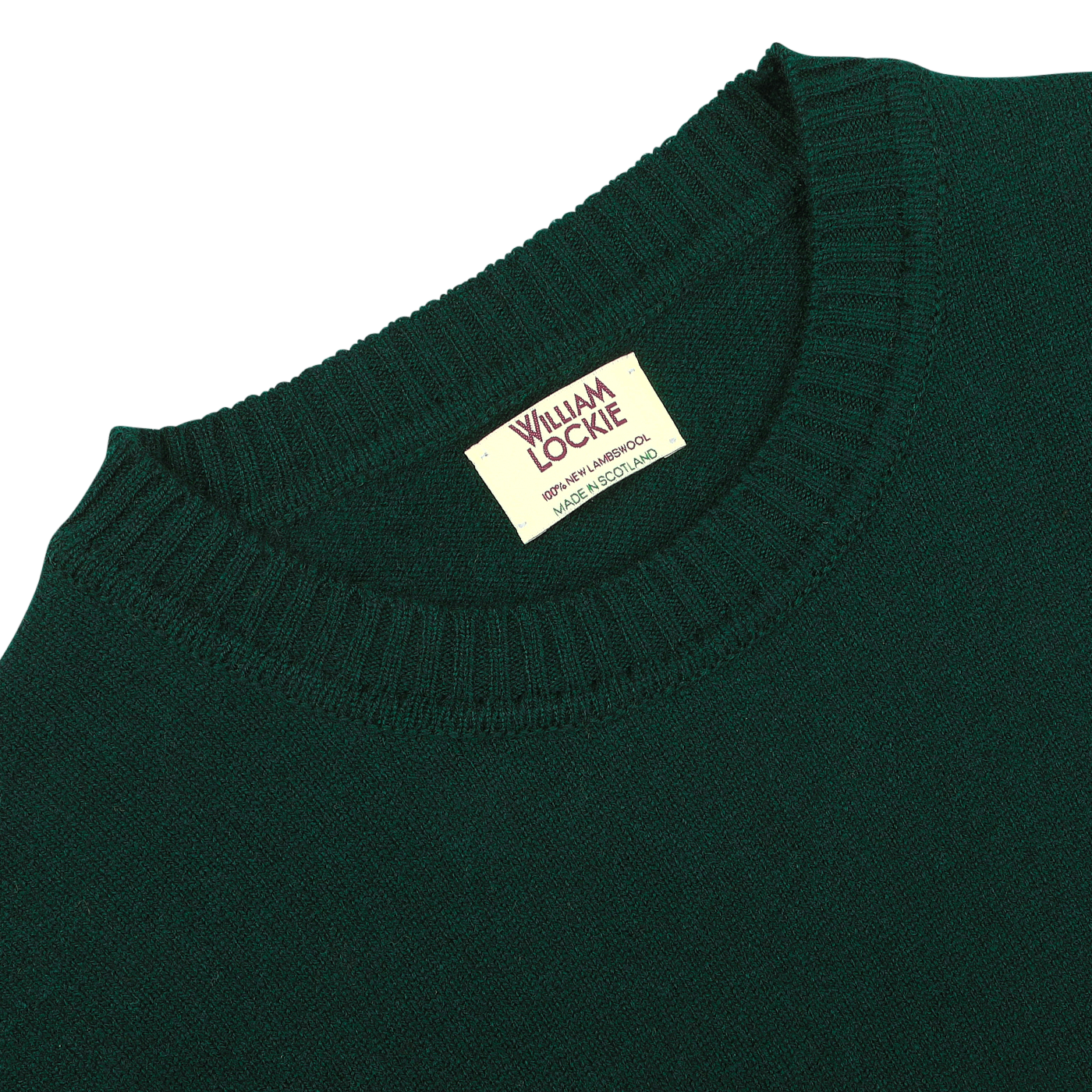 The Tartan Green Crew Neck Lambswool Sweater by William Lockie, crafted from Scottish lambswool, features ribbed details and a visible label for an extra touch of warmth.