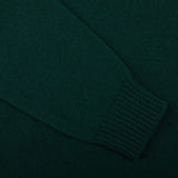 A close up of a William Lockie Tartan Green Crew Neck Lambswool Sweater.