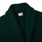 A William Lockie Tartan Green Lambswool Shawl Collar Cardigan with a label on it.