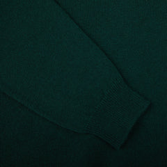 A close up of a dark green William Lockie Tartan Green Lambswool V-Neck Sweater.