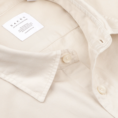 Close-up of the Cream Beige Cotton Twill Legacy Shirt by Xacus, featuring a visible label inside the collar.