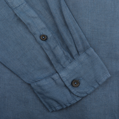 Close-up of the Dark Blue Washed Linen Legacy Shirt by Xacus, highlighting a pure linen sleeve with two sleek buttons.