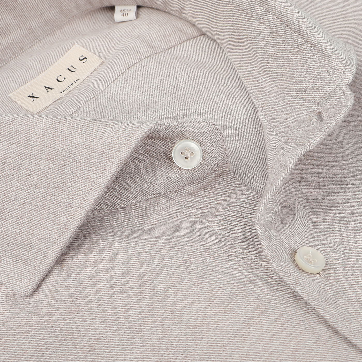 Close-up of the Xacus Light Beige Cotton Flannel Tailor Fit Shirt in pure cotton flannel, featuring visible buttons and a slightly open collar.