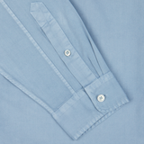 Close-up of a Light Blue Washed Cotton Twill Legacy Shirt cuff with buttons by Xacus.