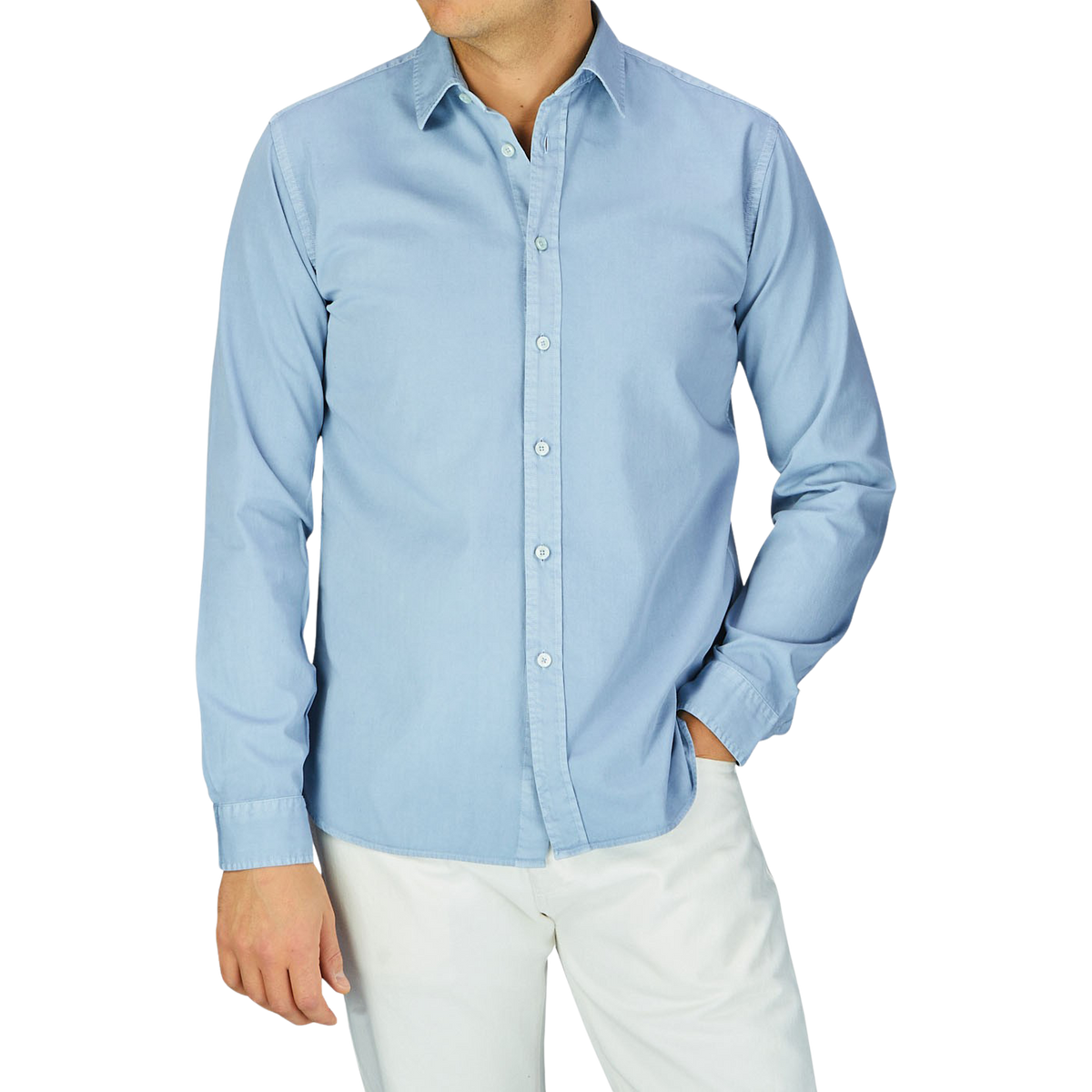 A person wearing a Xacus Light Blue Washed Cotton Twill Legacy Shirt and white pants.