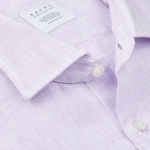 Close-up of a light Lilac Striped Washed Linen Legacy Shirt by Xacus with collar and buttons.