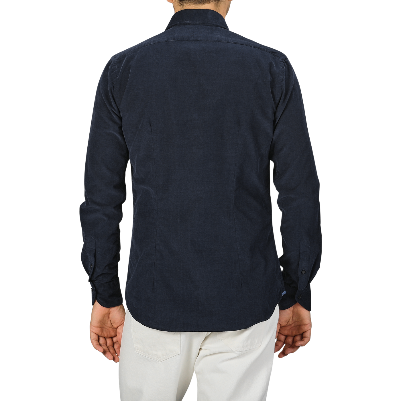 A person standing with their back to the camera, wearing a Navy Blue Cotton Corduroy Tailor Fit Shirt by Xacus and white pants.