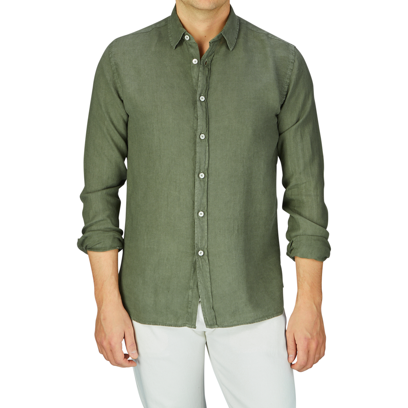Man wearing an Xacus Olive Green Washed Linen Legacy Shirt with a cut-away collar and white pants.