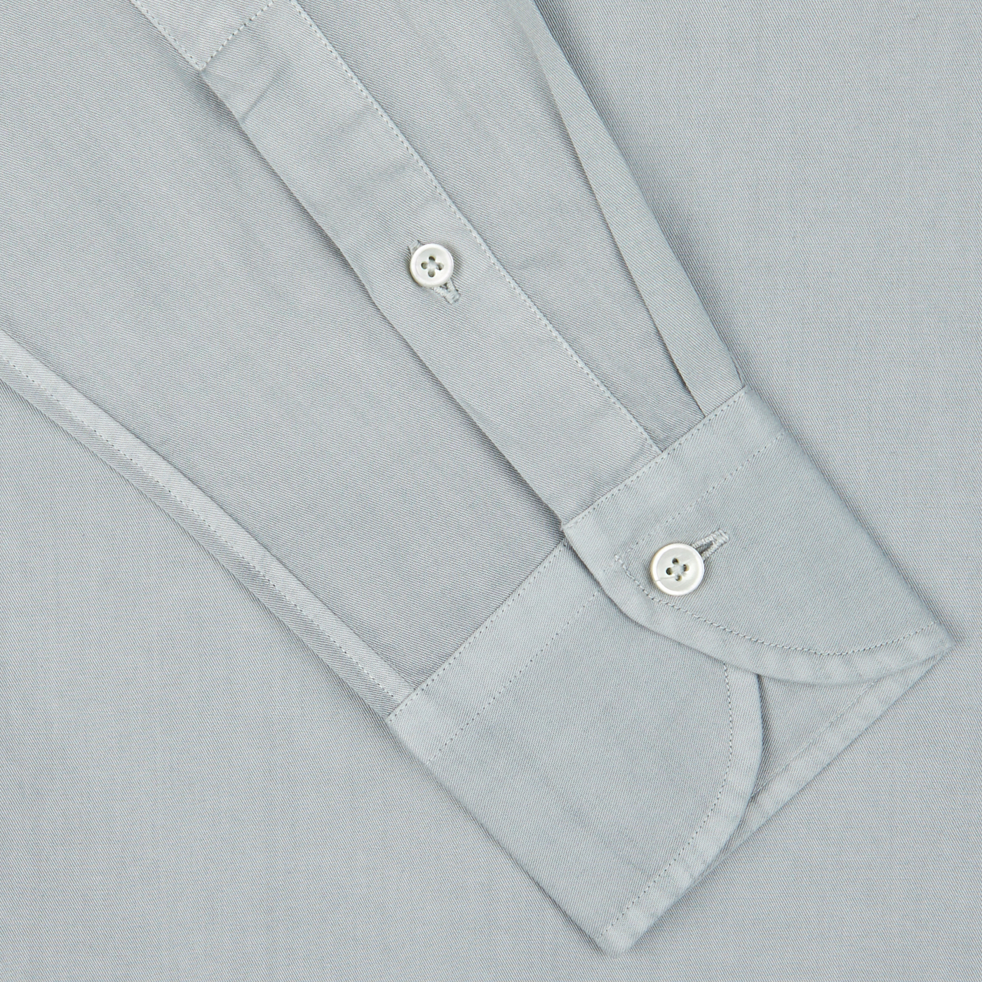 Close-up of a Sage Green Cotton Twill Tailor Fit Shirt cuff with buttons by Xacus.