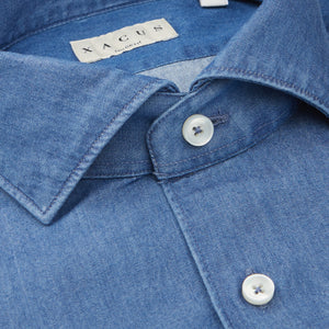 The collar of a Washed Blue Cotton Denim Casual Shirt by Xacus.