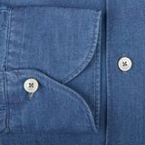 A close up of a slim fit washed blue cotton denim casual shirt with buttons by Xacus.