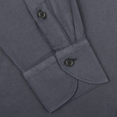 Close-up of a Washed Navy Mussola Cotton Tailor Fit Shirt cuff by Xacus, featuring two black buttons, neatly folded to highlight the pure mussola cotton fabric.