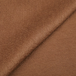 A close up image of a Yacaia Brown Superfine Merino Wool Scarf fabric.