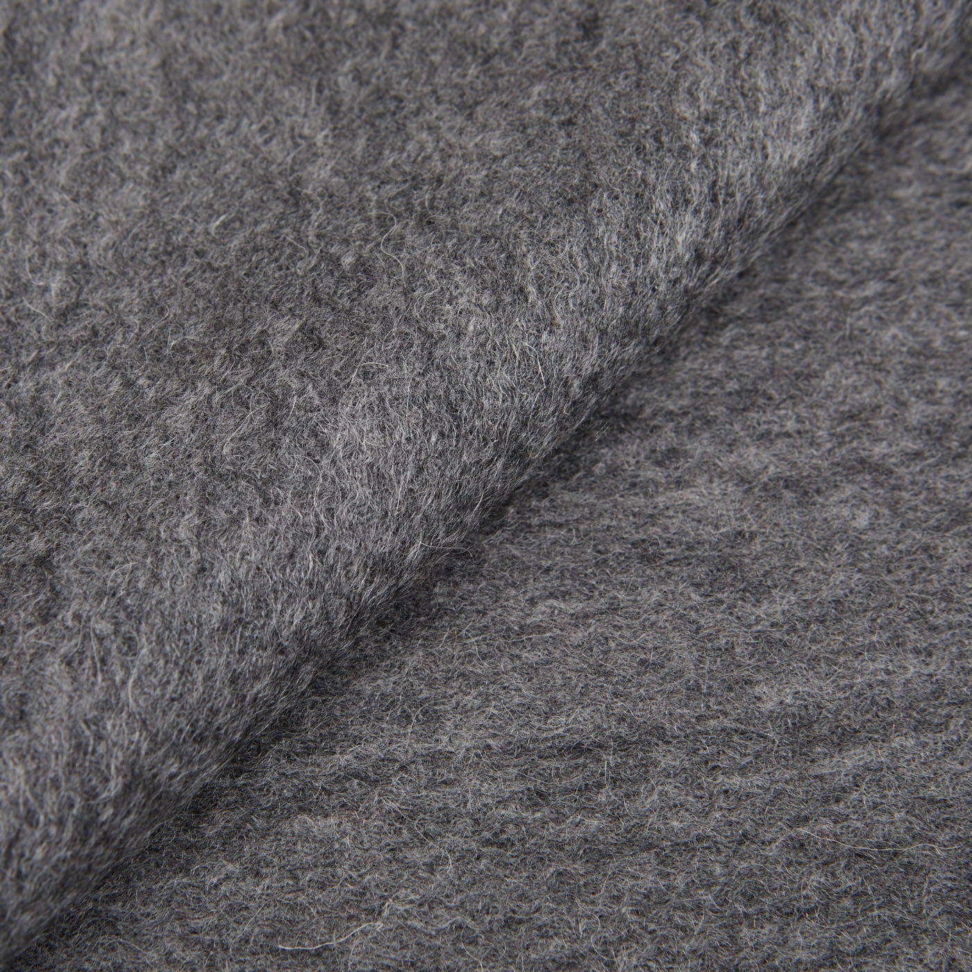 A close up image of a Yacaia Grey Superfine Merino Wool Scarf.