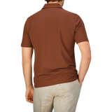 The back view of a man wearing a Coffee Brown Zanone ice cotton polo shirt.