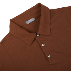 A Zanone Coffee Brown Ice Cotton Polo Shirt with buttons on the collar.